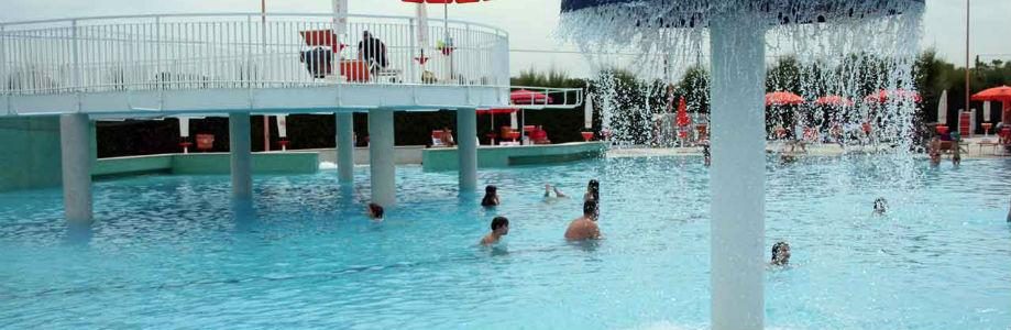 Lido golden passage in Varcaturo with pine forest, swimming pools and games One of the Varca D'oro swimming pools in Varcaturo