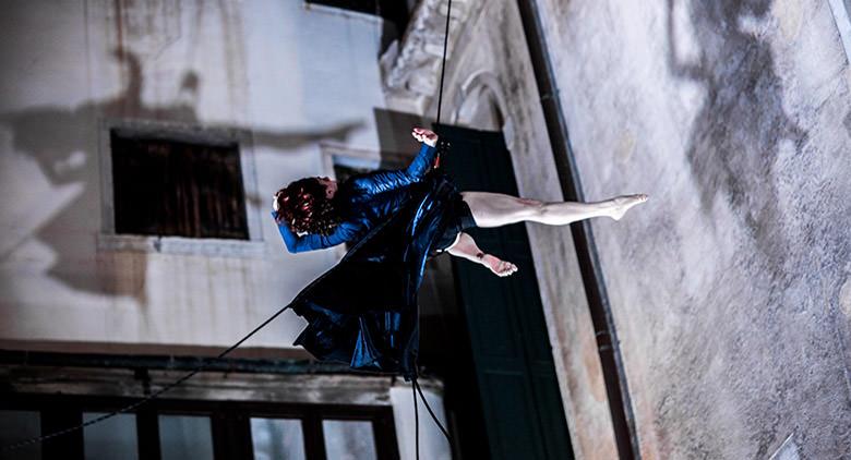 On the façade of Palazzo San Giacomo in Naples, the Vertical Dance