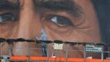 Mostra fotografica a San Giovanni a Teduccio sul murales di Maradona