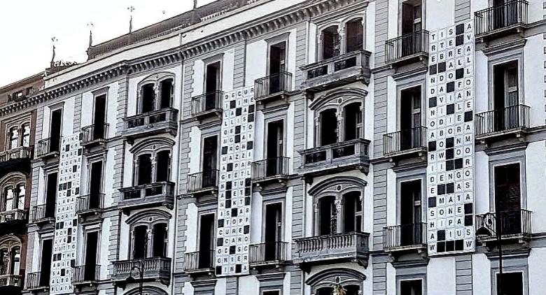 Exterior of the Parker's hotel in Naples with a giant crossword puzzle