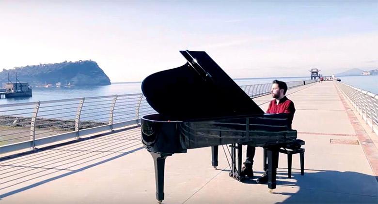 On the Pont of Bagnoli in Naples, musical events at sunset