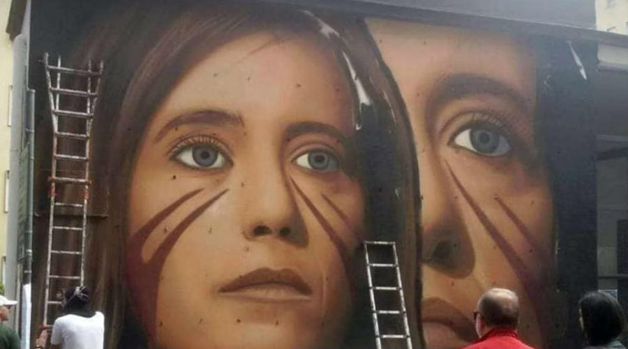 Jorit completes the mural on Ilaria Cucchi and his warlike face appears in Naples