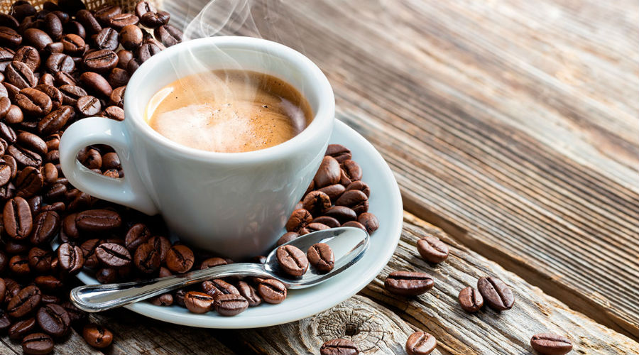 Coffee beans and cup of coffee