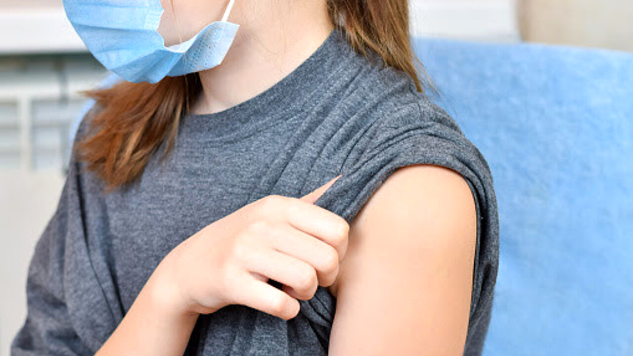 Little boy gets vaccinated