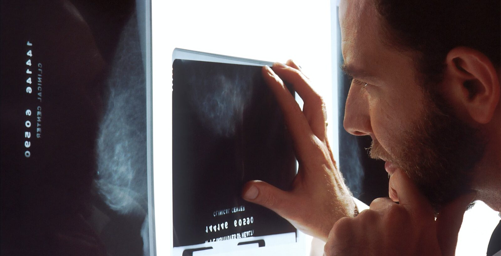 person holding black tablet computer