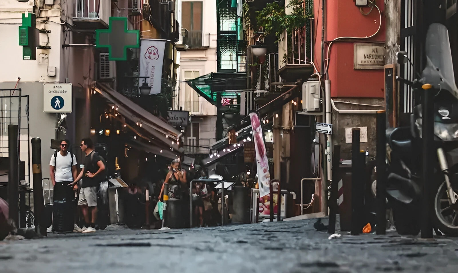 People walking around the Spanish neighborhoods