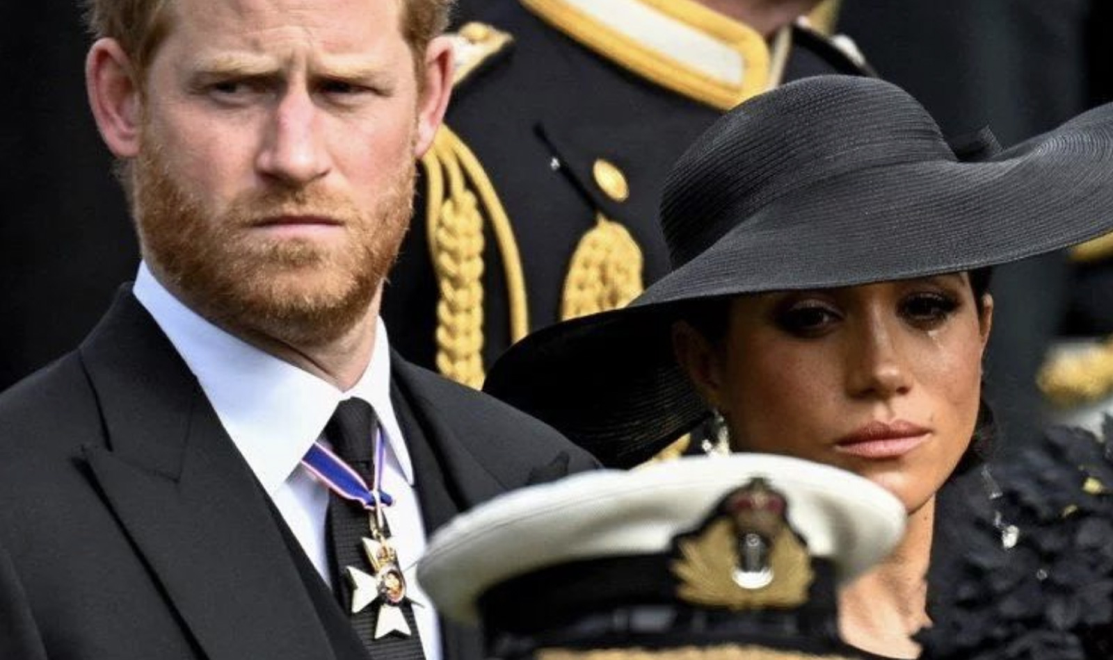 Harry y Meghan desconsolados en el funeral