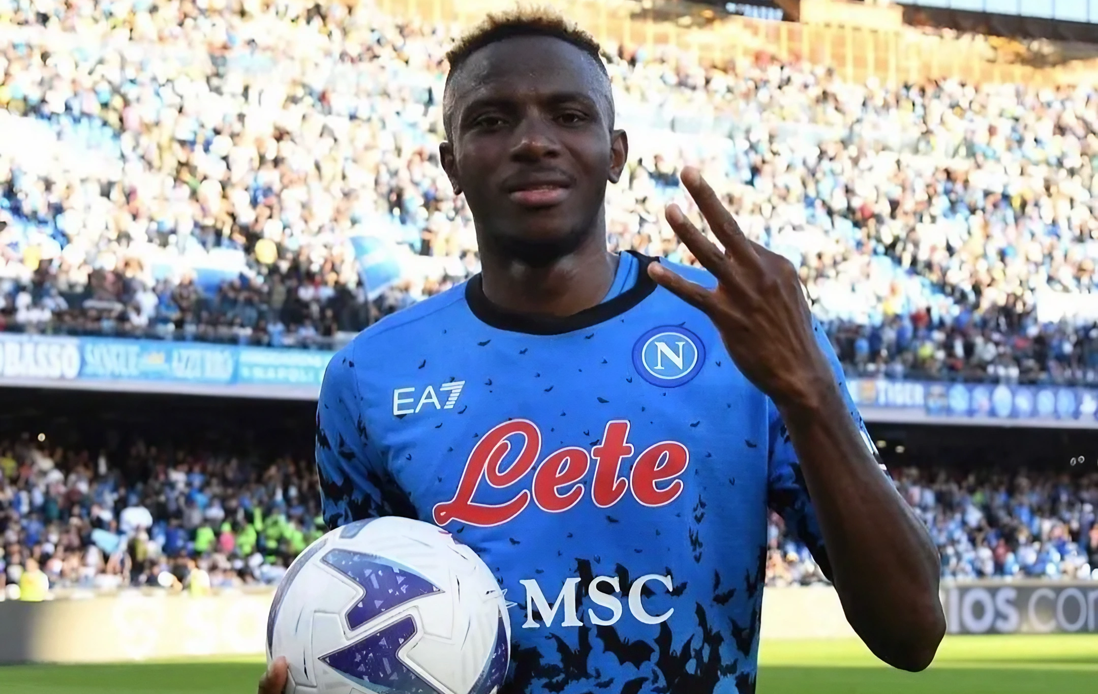 Victor Osimhen, SSC Napoli player, makes a victory gesture in front of a camera