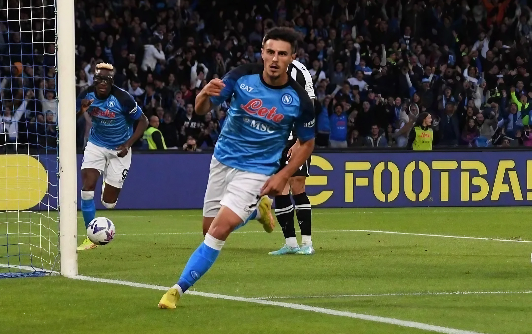 Elmas, SSC Napoli player, kicks the ball into the net and walks away to cheer