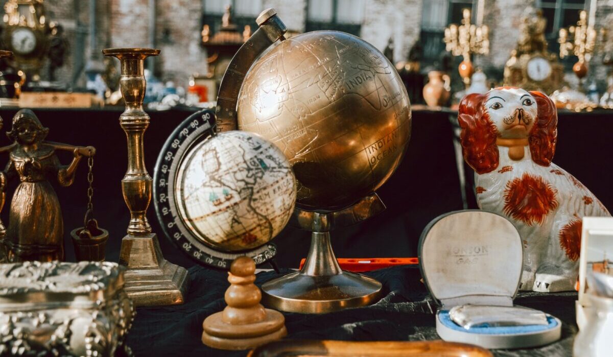 Two globes on a table at the flea market
