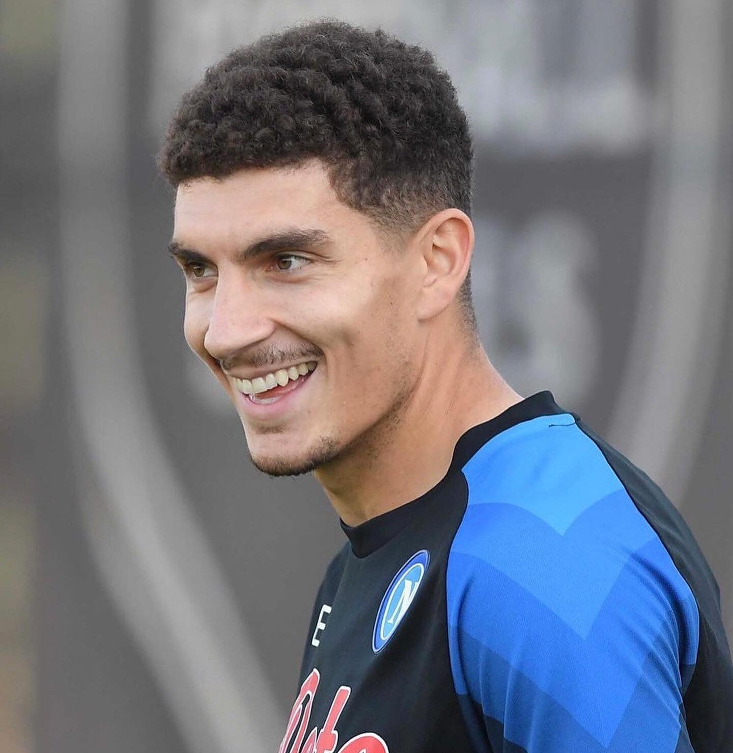 Di Lorenzo, SSC Napoli footballer, smiles in training