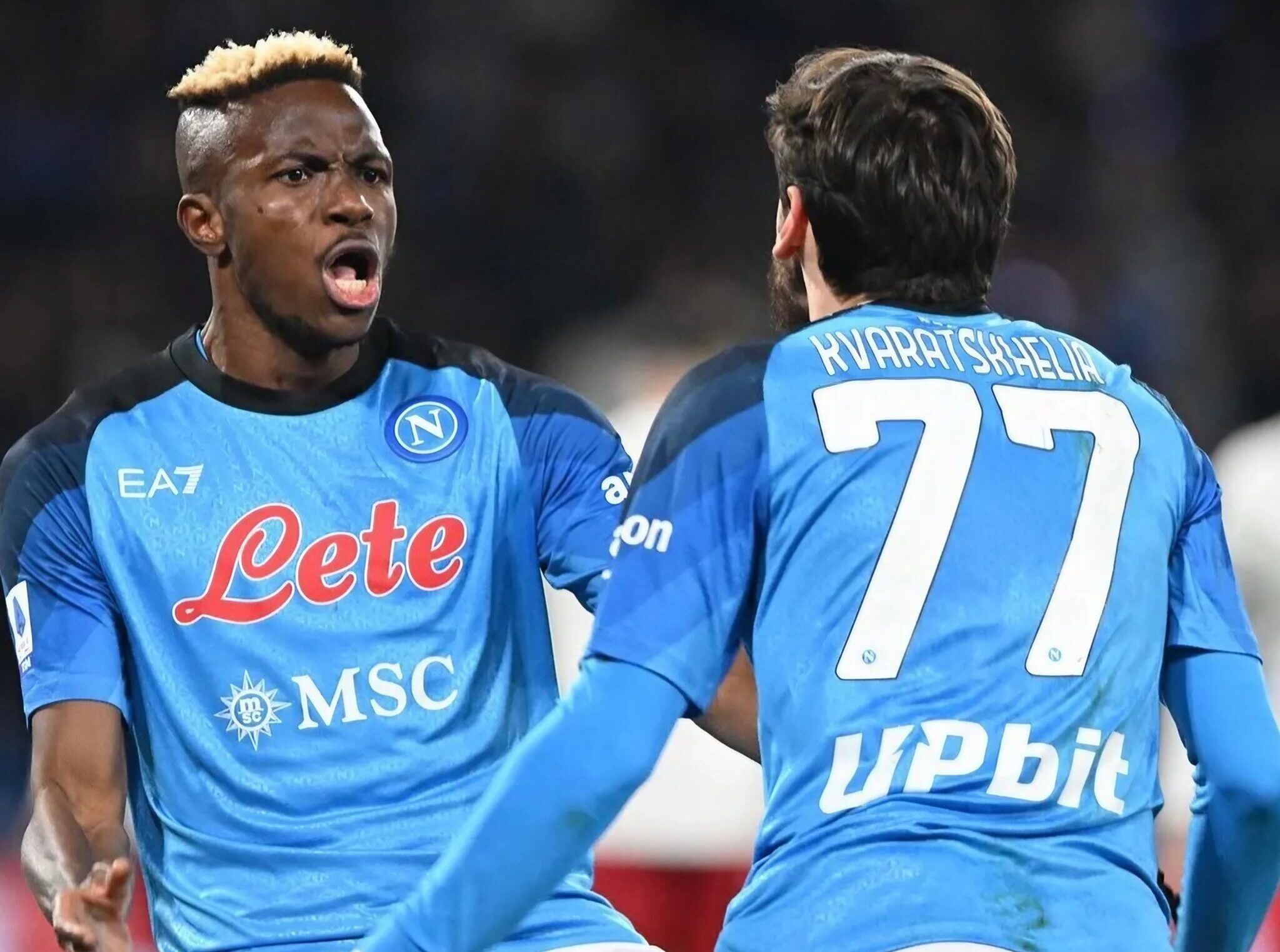 Osimhen and Kvaratskhelia, SSC Napoli players, cheer after a goal