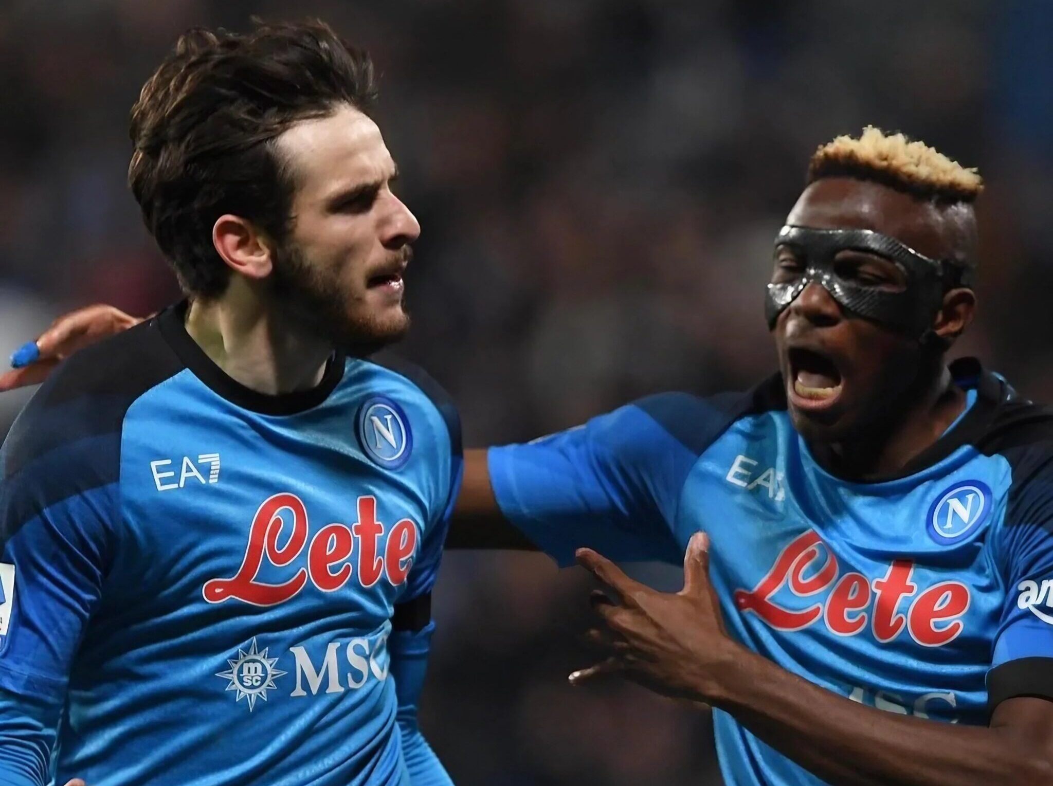 Osimhen and Kvaratskhelia, SSC Napoli players, cheer after a goal