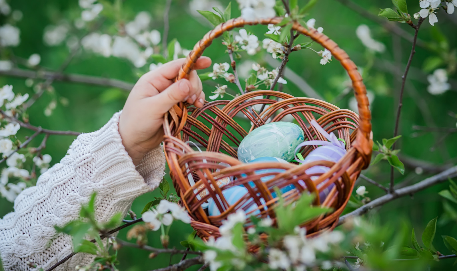 Easter basket with colored eggs