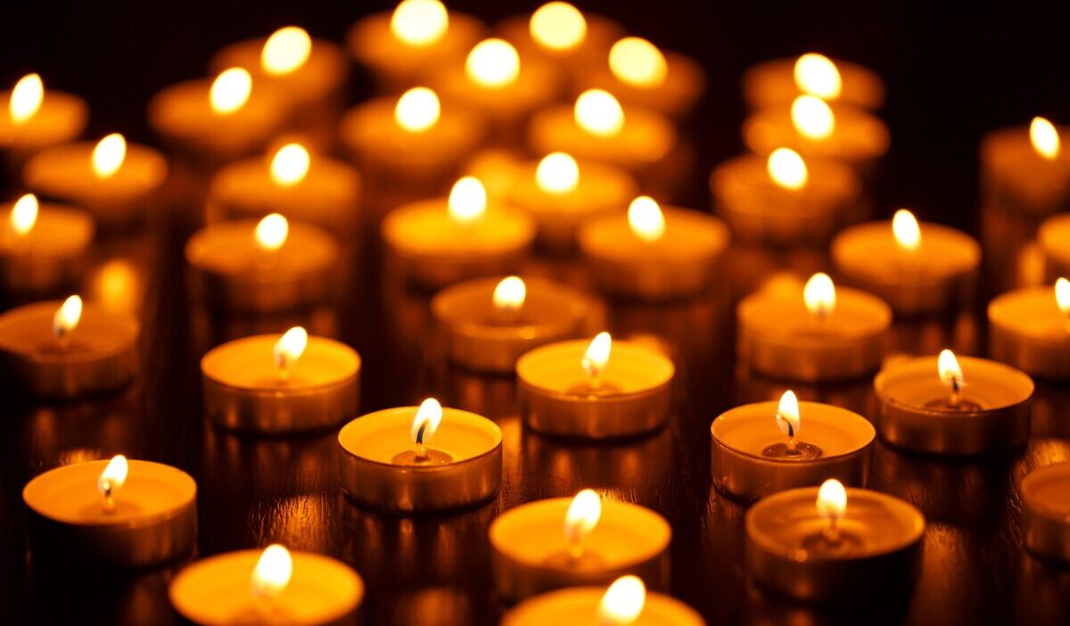 Many burning candles with shallow depth of field