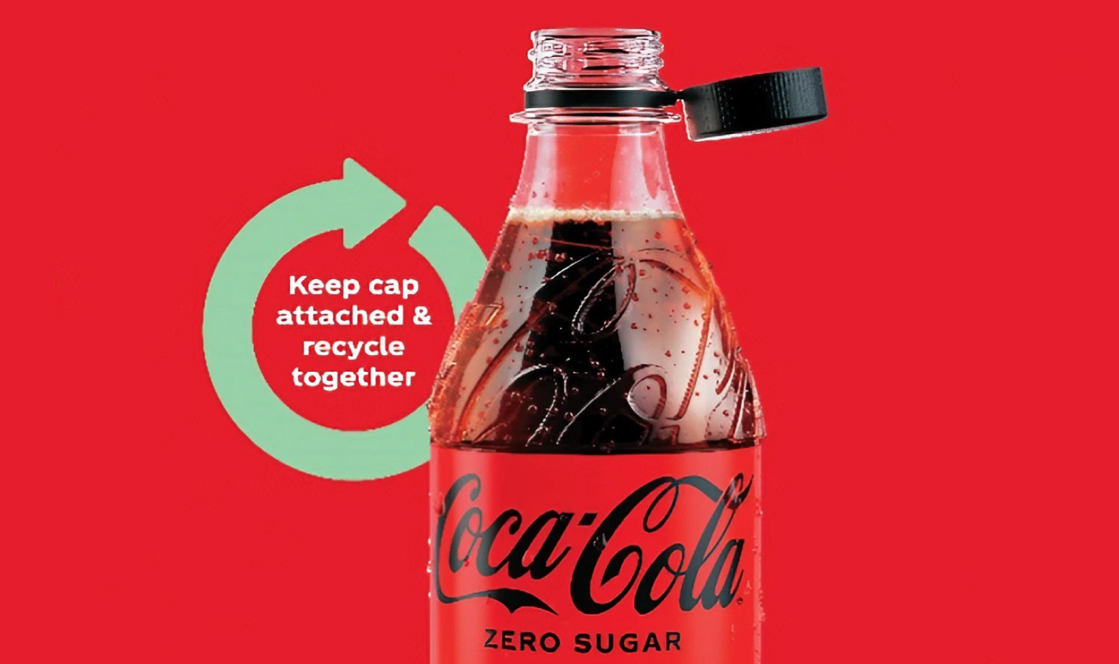 Tappi attaccati alla Coca Cola