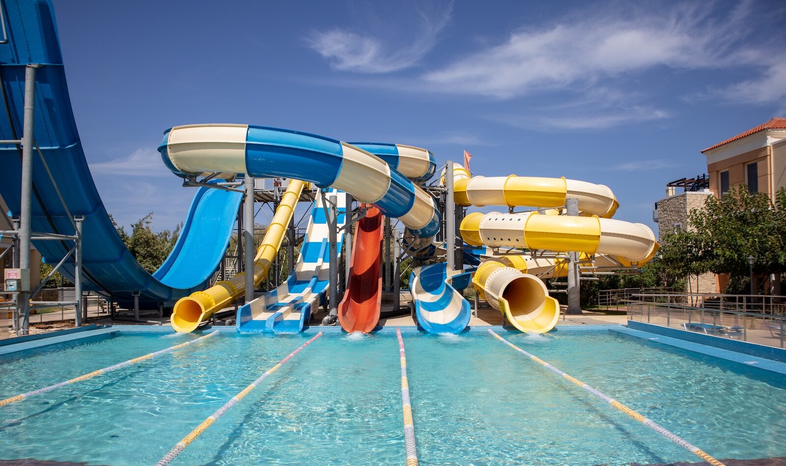 a water park with a water slide and slides