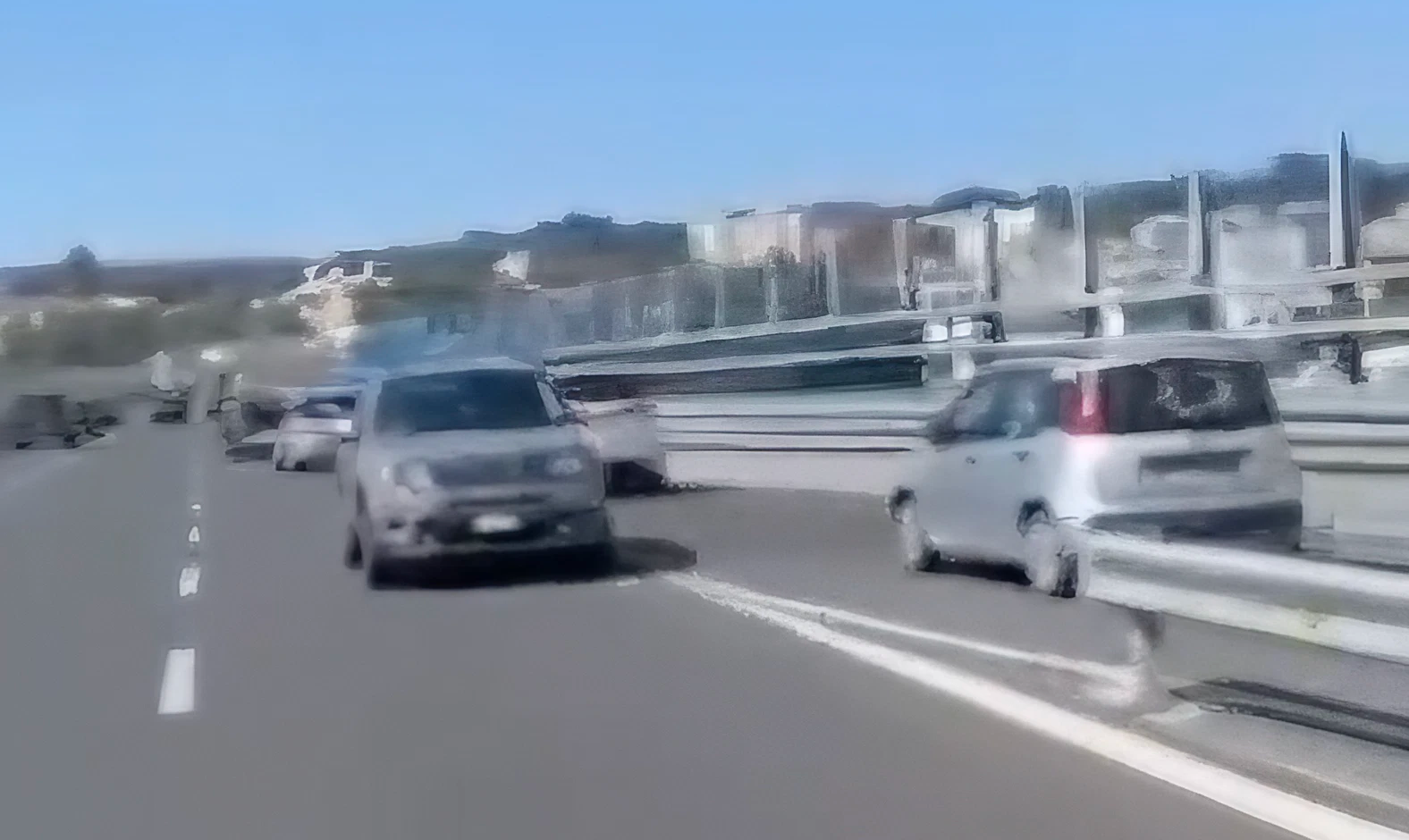 SUV in reverse on the ring road in Naples