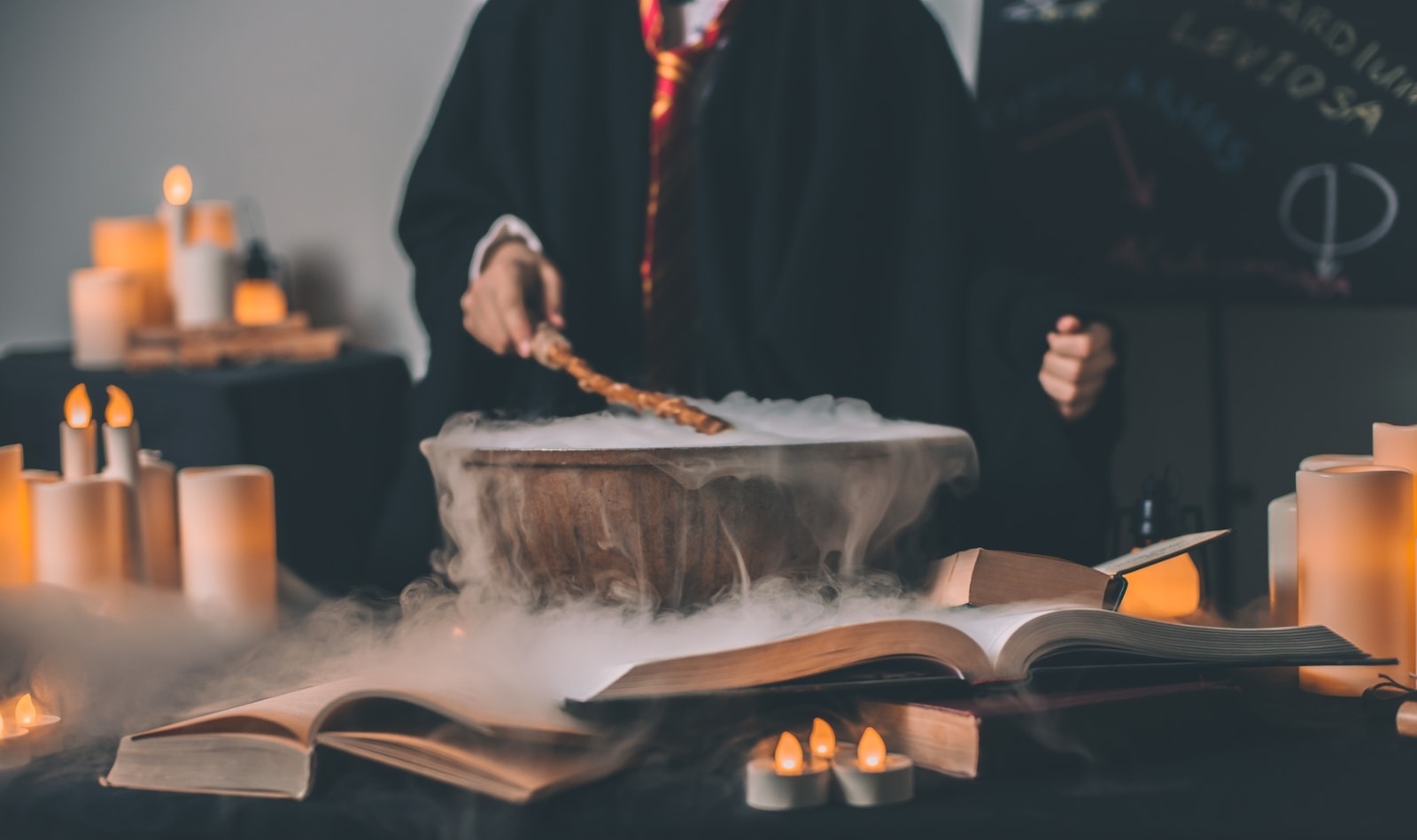 person holding wand on top of bowl