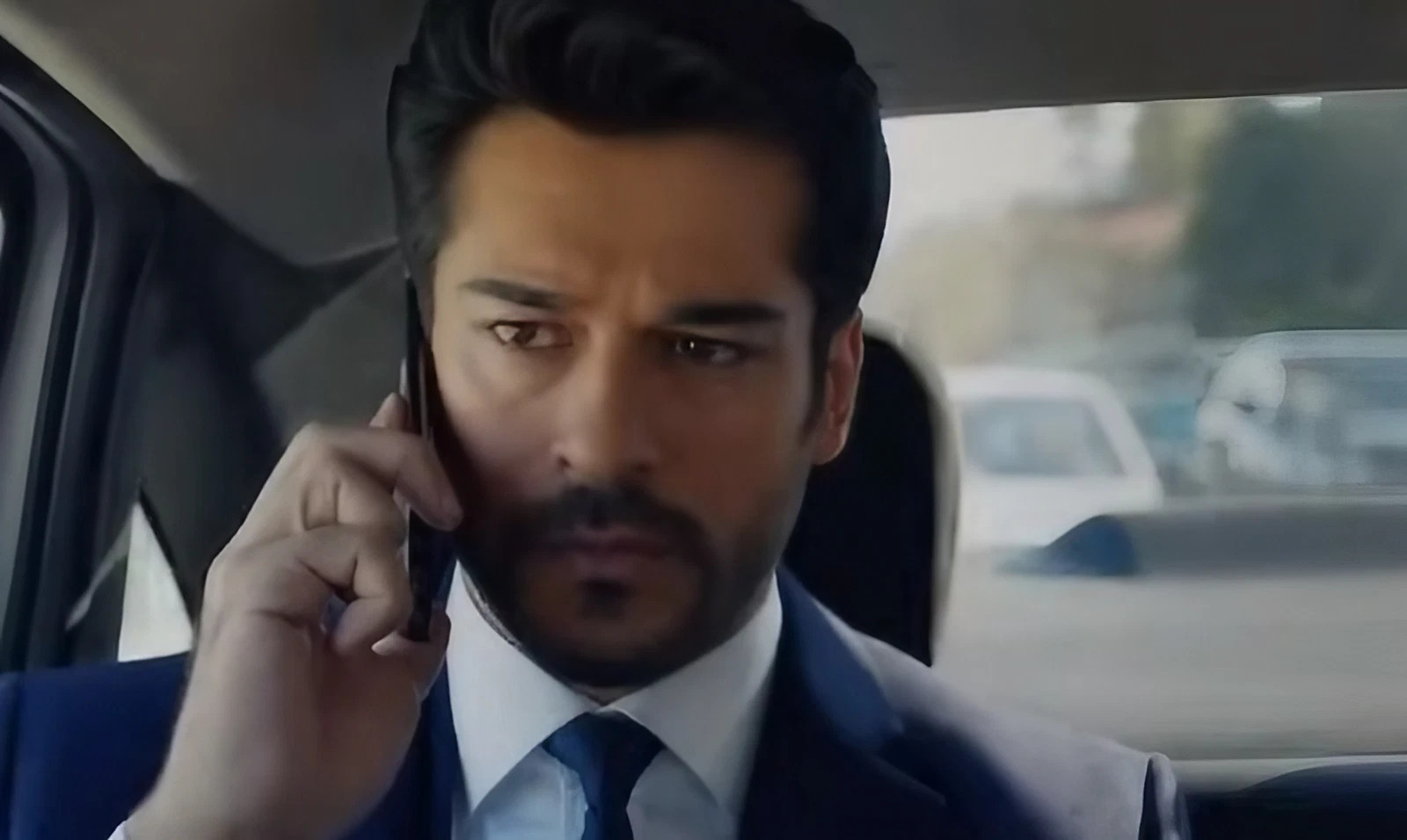 Kemal on the phone in Endless Love